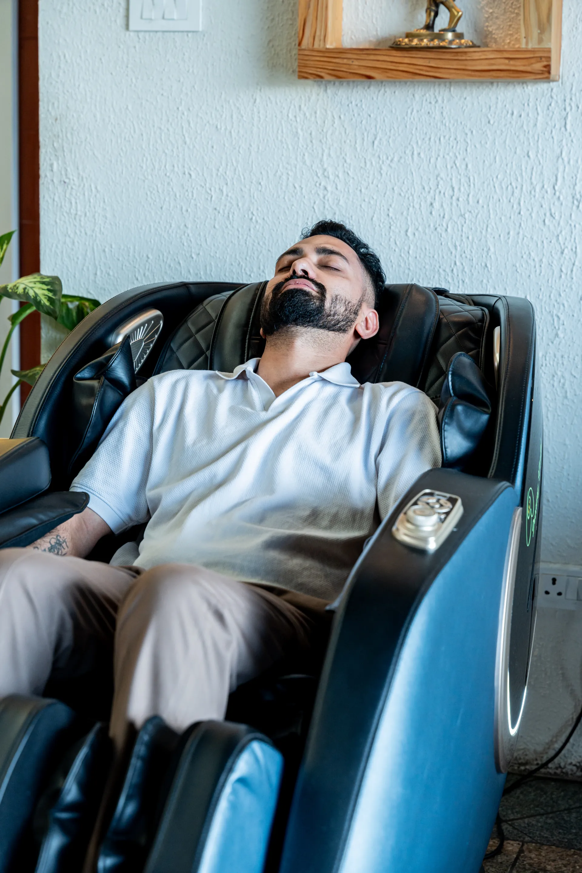 Guest relaxing in massage chair