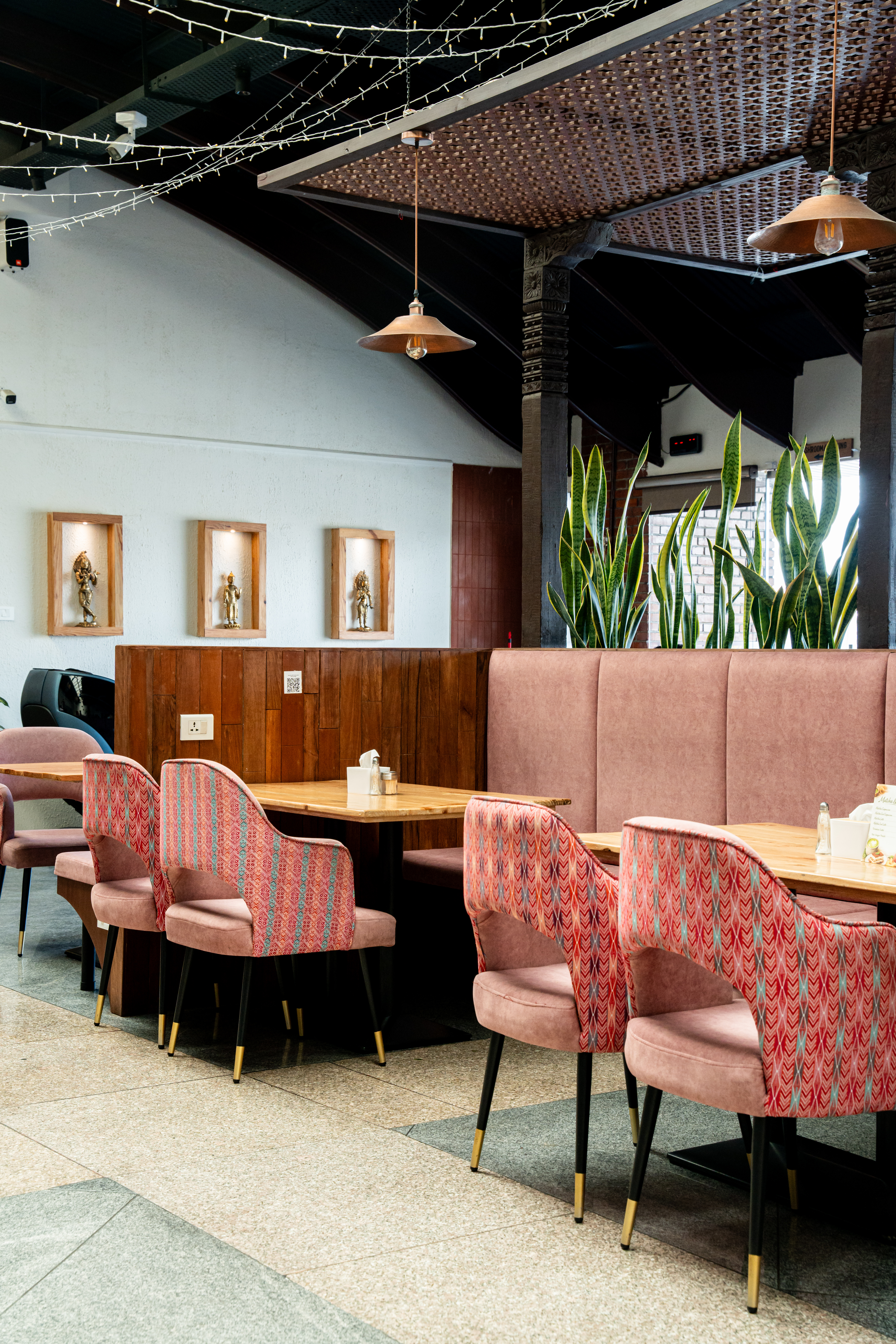 Yatra Lounge interior with traditional Dhaka-pattern seating